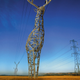 Illustration for article titled These Beautiful Giant Sculptures Support Power Lines With Style